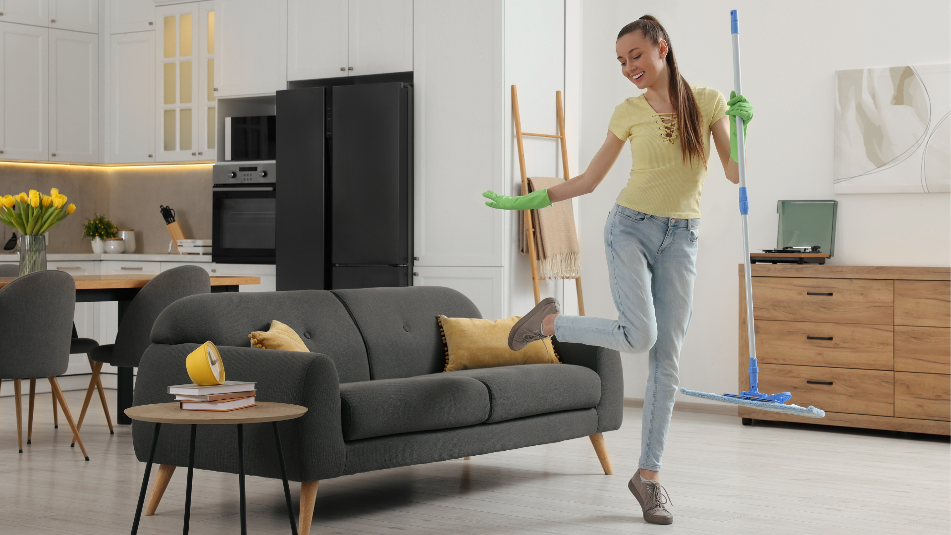 A woman cleaning a room in her home.