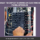 a purple box with a photo of an electrical panel with a persons hands working on it.