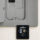 Whole-home surge protector installed below an electrical panel